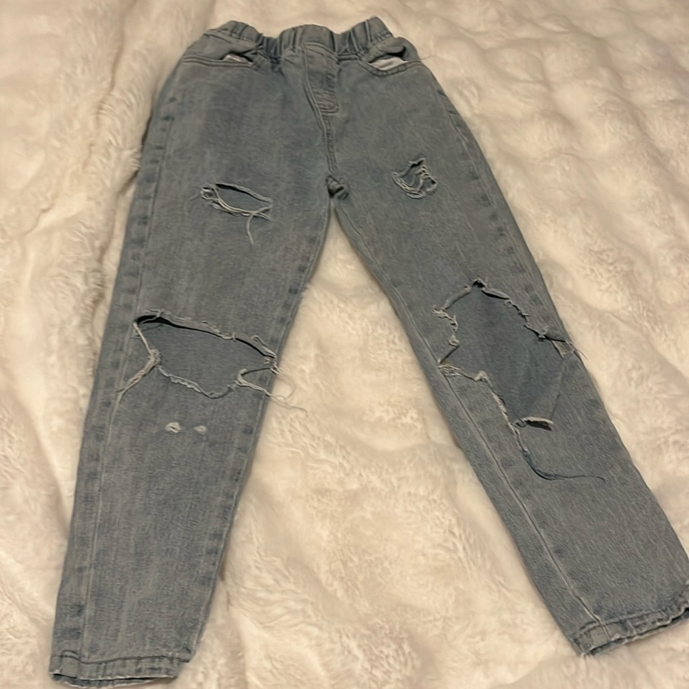 jeans with slight holes size 150